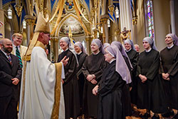 The Evangelium Vitae Medal was presented to the Little Sisters of the Poor for their ministry to the elderly and poor and their courage in standing for religious freedom in the face of the federal government’s contraception mandate. Bishop Kevin Rhoades greets the Little Sisters of the Poor after Mass in the Basilica of the Sacred Heart, Notre Dame.