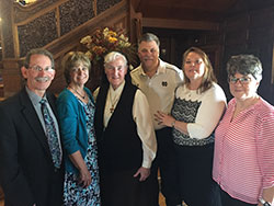 South Bend TV Mass volunteers enjoy time together following a Mass. Pictured here are Andy and Linda Knapp, Sister Agnes Marie Regan, OSF, Rick and Paula Burmeister and Paula Olen.