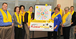 Principals and administrators gather for a photo promoting National School Choice Week during the Jan. 10 meeting for Catholic schools administrators at the Catholic Center in Evansville. The Message photo by Tim Lilley.