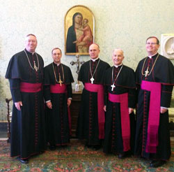 The five bishops of Indiana as they wait to meet the pope on February 9, 2012. From left: Bishop Christopher J. Coyne of Indianapolis, Bishop Charles Thompson of Evansville, Bishop Kevin Rhoades of Fort Wayne-South Bend, Bishop Dale Melczek of Gary, and Bishop Timothy Doherty of Lafayette.