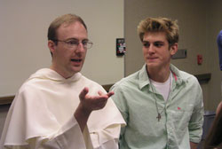 Dominican Brother Patrick Tobin talks with Indiana University student Greg Jansen, part of the Dominicans’ efforts to share the faith on college campuses.