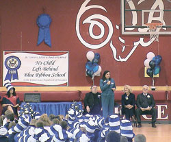 Betty Popp, principal at St. Lawrence School in Indianapolis, congratulates students for doing their part to help the school be recognized as a Blue Ribbon School of Excellence by the U.S. Department of Education. (Photo by Cindy Clark) 
