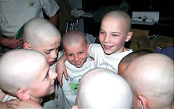 After Joey Chamness, right, was diagnosed with cancer, his twin brother, Robbie, and other friends from St. Thomas Aquinas School shaved their heads for the St. Baldrick’s Foundation. (Submitted photo) 
