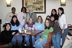 Notre Dame Sister Carolyn Sur, campus minister at Saint Mary-of-the Woods College, is shown with students on a trip to Chicago in 2006. Sister Carolyn is standing in the center of the back row. (Submitted photo) 