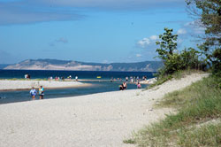 Platte River flows into Lake Michigan at Sleeping Bear Dunes National Lakeshore. The shallow, sandy bottom of the riverbed makes it fun for tubing.