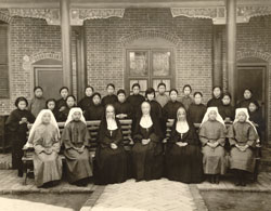 In this undated photo, seated in the middle of the front row, are three members of the Sisters of Providence of Saint Mary-of-the-Woods, who were among the order’s first missionaries to China in 1920: from left, Sister Marie Patricia Shortall, Sister Marie Gratia Luking and Sister Mary Margaretta Grussinger. Surrounding them are the earliest postulants and novices of the Sister-Catechists of Providence, a religious order of Chinese women founded by the Sisters of Providence. (Submitted photo) 