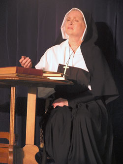 St. Lawrence parishioner Sandra Hartlieb of Indianapolis portrays St. Theodora Guérin in an original play that she wrote for Sisterhood Christian Drama Ministry called “In Her Own Words.” She presented the play with her sister, Nora Pritchett of Sellersburg, for the Sisters of Providence at Saint Mary-of-the-Woods in July and St. Jude School students in Indianapolis in October. Their husbands, Ron Hartlieb and Alan Pritchett, as well as their brother, Bob Braden, and sisters, Peggy Young and Bibiana Richardson, are part of their family’s dramatic theater ministry. Sisterhood Christian Drama Ministry presents a variety of dramatizations about women and men in the Bible. Sisterhood is a non-profit organization, and family members rely on grants, sponsorships and free-will donations to cover production costs.