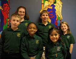 Sharing smiles and stories of joy, six students from St. Gabriel School in Indianapolis offer their thoughts about happiness. From left are Michael Bir, Amanda Ward, Taylar Minnis, Allen Dininger, Nicole Loza and Elizabeth Bir.