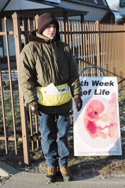 St. Joan of Arc parishioner Patty Yeadon of Indianapolis volunteers as a pro-life sidewalk counselor on Jan. 19 in front of the Clinic for Women on West 16th Street in Indianapolis. (Photo	by	Mary Ann Wyand)	