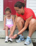 Mother and child prepare for a run