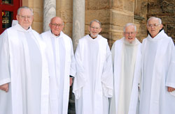 Benedictine Fathers Columba Kelly, from left, Harold Hammerstein, Simeon Daly, Rupert Ostdick and Damian Schmelz pose for a photograph after celebrating their priesthood jubilees on May 25 at Saint Meinrad Archabbey Church in St. Meinrad. (Submitted photo)	