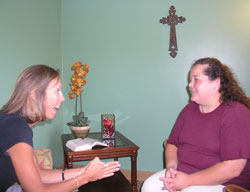 Cindy Workman, left, meets monthly with her spiritual director, Annie Endris. “Spiritual direction helps me see God being active in my day,” Workman says. “Even when I’m making macaroni and cheese or changing diapers, I see him as part of that.” (Photo by John Shaughnessy) 