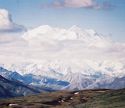 Beautiful views of majestic mountain ranges, like Mount Denali, form a backdrop for vacation destinations in Alaska. Denali National Park is located in the northernmost range of the Rocky Mountains. Mount Denali was formerly named Mount McKinley, and is the highest peak in North America. Its peak is often obscured by mists and clouds. (Submitted photo) 