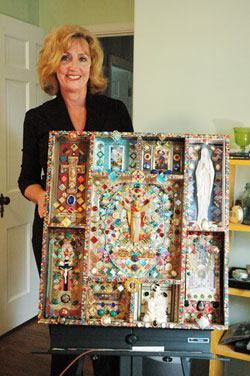 Christ the King parishioner Nancy Shields of Indianapolis created this ornate, multimedia religious collage that she calls “The Jesus Project” over a period of two years in her spare time. She said making it was an expression of prayer for her. (Photo by Mary Ann Wyand)