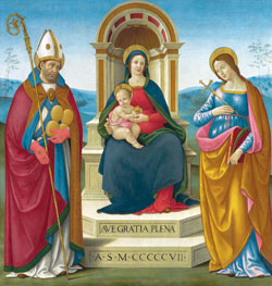 After a two-year restoration effort by a team of conservators, this altarpiece titled “Virgin and Child Enthroned with St. Justus of Volterra and St. Margaret of Antioch” is on display in the Clowes Courtyard at the Indianapolis Museum of Art. It was painted by artist Sebastiano Mainardi of Florence in 1507 during the height of the Italian Renaissance. (Submitted photo/courtesy Indianapolis Museum of Art) 
