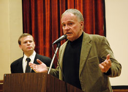 Former Illinois death row inmate Randy Steidl of Paris, Ill., talks about his wrongful conviction for two murders he did not commit and his lengthy incarceration during a Dec. 2 program at the Archbishop O’Meara Catholic Center in Indianapolis. Will McAuliffe, left, the executive director of the Indiana Coalition Acting to Suspend Executions, waits to answer a question from an audience member. (Photo by Mary Ann Wyand)