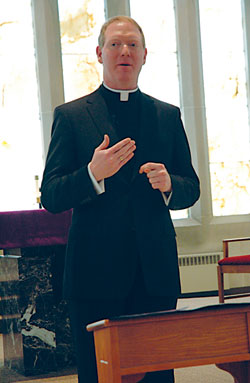 Father Patrick Beidelman, vice rector of the Bishop Simon Bruté College Seminary in Indianapolis and director of liturgy for the archdiocese, tells a group of young adults discerning their vocations in life that he is “grateful every day for having been loved by our Lord into this dream that he has for me, and open to the future, whatever it might be for me.” Father Beidelman was the keynote speaker for a Lenten day of reflection on vocations to the priesthood and religious life on Feb. 26 at the St. Augustine Home for the Aged in Indianapolis. (Photo by Mary Ann Wyand)