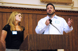 Indianapolis Colts center Jeff Saturday and his wife, Karen, of Carmel, Ind., praise the teenage peer mentors for the archdiocesan A Promise to Keep: God’s Gift of Human Sexuality chastity program for their volunteer service as role models during an annual awards luncheon on April 15 at the Archbishop O’Meara Catholic Center in Indianapolis. (Photo by Mary Ann Wyand)