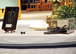 Blessed Teresa of Calcutta’s rosary and the crucifix she wore at her waist as well as her well-worn sandals were displayed during the memorial Mass on July 14 at SS. Peter and Paul Cathedral. (Photo by Mary Ann Wyand)