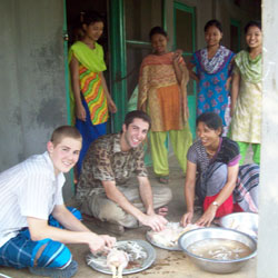 Bobby Powers, second from left, has made two trips to Bangladesh in recent summers to teach English to high school students and help with alternative energy efforts. He is a graduate of Immaculate Heart of Mary School and Cathedral High School, both in Indianapolis. (Submitted photo)