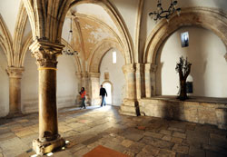 Visitors walk into the Holy Cenacle, the upper room believed to be the site of Jesus’ Last Supper, on Mount Zion in Jerusalem on Feb. 2. (CNS photo/Debbie Hill)