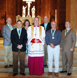 The 2012 St. John Bosco Award recipients pose for a photograph with Bishop Christopher J. Coyne, apostolic administrator, during the Catholic Youth Organization awards ceremony on May 1 at SS. Peter and Paul Cathedral in Indianapolis. They are, from left, Stan Schutz, Jeff Kirkhoff, Nancy Prather, Pat Sullivan, Rob Goldner and Gregg Bennett. (Photo by Jerry Ross)