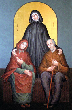 In this religious icon, St. Jeanne Jugan is depicted as Sister Mary of the Cross, the foundress of the international Little Sisters of the Poor, caring for an elderly poor man and woman. Admission and parking are free for an Oct. 11 musical tribute to her life and ministry to be performed at The Palladium in Carmel, Ind. Tickets must be reserved in advance by calling 317-843-3800. (Icon of St. Jeanne Jugan with elders by George and Sergio Pinecross, © 2003)