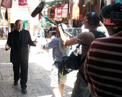 Father Robert Barron walks down a street in Jerusalem during the filming of his 10-part documentary series “Catholicism.” (Photo courtesy Word on Fire Ministries)