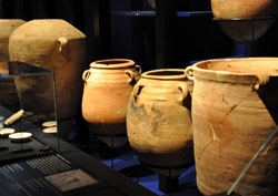 These pottery jars contained ancient religious documents for more than 2,000 years before they were discovered in 11 remote caves near Khirbet Qumran on the desolate northern shores of the Dead Sea in Israel. They were found by Bedoin goat herders and archaeologists between 1947 and 1956. Archdiocesan pilgrims traveled to the Cincinnati Museum Center on Dec. 12 to view fragments of the Dead Sea Scrolls displayed in a “once-in-a-lifetime” traveling exhibit on loan from the Israel Antiquities Authority. (Photo by Mary Ann Garber)