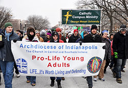 Indianapolis young adults march with their banner at the March for Life in Washington on Jan. 25. (Photo by Natalie Hoefer)
