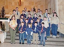 Members of Cub Scout and Boy Scout Pack 102 and their troop leaders pose in St. Meinrad Church in St. Meinrad on Feb. 3 after a Scout Sunday Mass. (Submitted photo)