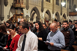 Every Sunday evening, young adults fill St. John the Evangelist Church in Indianapolis for Mass. The influx and influence of young adult Catholics have made the downtown parish stronger and more vibrant, according to longtime parishioners. (Submitted photo)