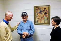 Clem Maga, center, shares a laugh with Bill Bickel and Christina Davis during a break in work at Holy Family Shelter in Indianapolis. After living for a month at the shelter in 1988 with his wife and six children, Maga has spent the past 25 years working at the shelter. Bickel is the shelter’s director, and Davis is the shelter’s director of operations. (Photo by John Shaughnessy)