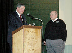 Bob Teipen, left, recognizes Jim Ganley for his 10 years of service to Catholic Radio Indy during its anniversary dinner on Feb. 25 at the northside Knights of Columbus Hall. Teipen is the founder and chairman of Inter Mirifica, Inc., which owns and operates Catholic Radio Indy. Ganley is the radio station’s general manager and president of its board of directors. (Photo by Mike Krokos)