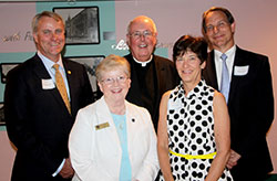 The co-chairs for the Sisters of St. Benedict of Our Lady of Grace Monastery capital campaign pose on Aug. 27 at the event that launched the public phase of the campaign. The co-chairs are Marian University president Daniel Elsener, left, monastery prioress Benedictine Sister Juliann Babcock, St. Luke the Evangelist Parish pastor Msgr. Joseph Schaedel, Constance Lund and Christopher Martin. (Submitted photo by Benedictine Sister Ann Patrice Papesh)