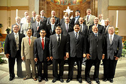 Twenty-one deacon candidates pose on Sept. 27 in SS. Peter and Paul Cathedral in Indianapolis after a Mass during which Archbishop Joseph W. Tobin received them as candidates. The candidates are, front row, from left, Steven Tsuleff, Wifredo de la Rosa, Martin Ignacio, Reynaldo Navarra, Juan Carlos Ramirez, Kenneth Smith and John McShea. In the middle row, from left, are Paul Fiserkeller, Robert Beyke, David Bartolowits, Gary Blackwell, Matthew Scarlett, Jerry Matthews, John Jacobi and John Hosier. In the back row, from left, are Deacon Patrick Bower, John Cord, Joseph Beauchamp, Tony Lewis, Oliver Jackson, Nathan Schallert, Charles Giesting and Deacon Kerry Blandford, archdiocesan director of deacon formation. (Photos by Sean Gallagher)
