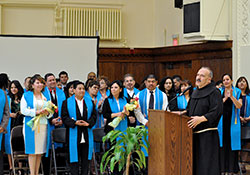 The first graduation class of the Hispanic Pastoral Leadership Institute listens as Franciscan Brother Moises Gutierrez speaks during a graduation reception at the Archbishop Edward T. O’Meara Catholic Center in Indianapolis on May 11, 2013. (File photo by Natalie Hoefer)