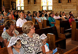 Members of the former Our Lady of Providence Parish in Brownstown sit in the church on June 26 during the final Sunday Mass celebrated there. The parish was merged on July 1 into St. Ambrose Parish in Seymour as part of the archdiocese’s Connected in the Spirit planning process. (Submitted photo)