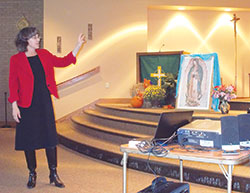 Speaker Theresa Deisher discusses how commercial vaccines made from the cells of aborted human fetuses are both unethical and unnecessary during an Oct. 22 presentation at the St. Paul campus of St. John Paul II Parish in Clark County. (Photo by Patricia Happel Cornwell)