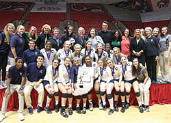 The 2016 girls’ volleyball team of Cathedral High School in Indianapolis is pictured on Nov. 5 at Worthen Arena in Muncie, Ind., after winning the Class 4A state championship. (Submitted photo) 
