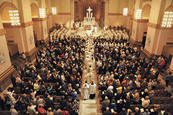 Then-Archbishop Joseph W. Tobin processes into SS. Peter and Paul Cathedral amid clergy, religious and lay Catholics from across central and southern Indiana on March 22, 2016, at the start of the annual archdiocesan chrism Mass. An assessment of the current pastoral needs of the Archdiocese of Indianapolis will involve Catholics from across central and southern Indiana, and is intended to help introduce the archdiocese to its next shepherd. (File photo by Sean Gallagher)