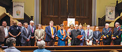 Then-Bishop Charles C. Thompson of Evansville, Ind., center, leads intercessory prayer during the city of Evansville’s interfaith observance of the National Day of Prayer on May 4. Representatives of various faith traditions offered pray and reflection during the gathering at Trinity United Methodist Church in Evansville. Archbishop Thompson organized the yearly interfaith prayer service. (Message photo by Peewee Vasquez)