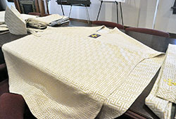 A chasuble created by Benedictine Brother Kim Malloy of Saint Meinrad Archabbey in St. Meinrad sits on July 20 on a table in the rectory of SS. Peter and Paul Cathedral in Indianapolis. Archbishop Charles C. Thompson will wear this chasuble during the July 28 Mass in the cathedral in which he will be installed as the seventh archbishop of Indianapolis. (Photo by Sean Gallagher)