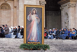 An image of Jesus of Divine Mercy is seen as Pope Francis leads a prayer service on the eve of the feast of Divine Mercy in St. Peter’s Square at the Vatican on April 2, 2016. (CNS photo/Paul Haring) 