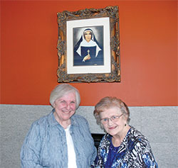 For 20 years, Providence Sisters Barbara McClelland, left, and Rita Ann Wade have made it their mission to add another layer of joy, hope and love to the lives of children and families in a near eastside Indianapolis neighborhood. (Photo by John Shaughnessy)