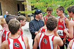 Father Jonathan Meyer, a track and cross country coach at East Central High School in St. Leon, offers advice to runners. (Submitted photo)