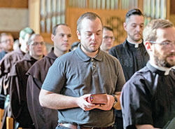 Seminarian Aidan Hauersper prays Morning Prayer on May 4 in the St. Thomas Aquinas Chapel at Saint Meinrad Seminary and School of Theology in St. Meinrad. A member of St. Joseph Parish in Jennings County, Hauersperger took part in the last academic year in Saint Meinrad’s new propaedeutic program for new seminarians. (Photo courtesy of Saint Meinrad Archabbey)