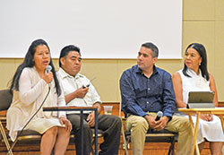 Mercedes Ahuatl, left, answers a question about Natural Family Planning (NFP) during a conference at the Archbishop Edward T. O’Meara Catholic Center in Indianapolis on July 29. Her husband Gaspar Xochitlatoa, second from left, and NFP panel discussion moderators Jose Rivas and Lilia Lua listen to her response. (Photo by Natalie Hoefer)