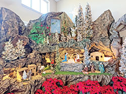 This crèche in the narthex of St. Joseph Church in Indianapolis was designed and constructed by Thoai Keeley, a former member of the parish’s Vietnamese community who moved to South Carolina but returns each Advent to design and build a new crèche for the church. (Submitted photo by Father Pious Malliar Bellian)