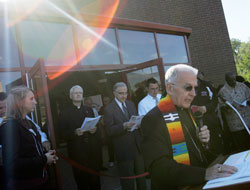 Bishop Dale J. Melczek leads a prayer service prior to blessing the $4.5 million Student Activity/Community Center at Calumet College of St. Joseph, Whiting, Sept. 17. The athletic facility represents the first new construction in the college's 58-year history. (Tim Hunt photo)